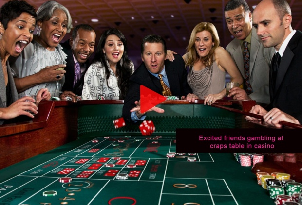 Excited-friends-gambling-at-craps-table-in-casino